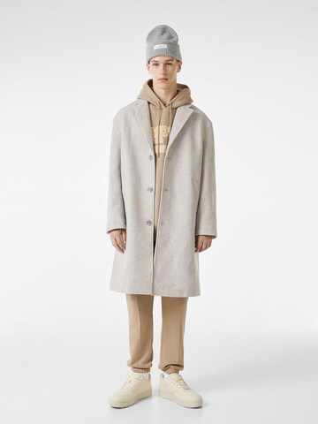 Bershka Between-seasons coat in Grey: front