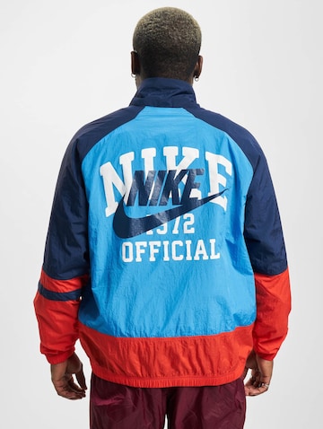 Veste mi-saison Nike Sportswear en violet : devant