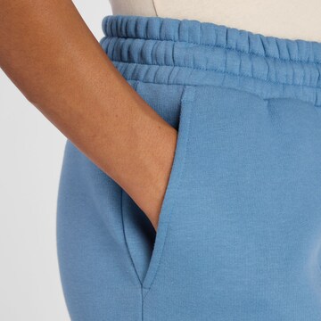 new balance Wide leg Broek 'Linear Heritage' in Blauw