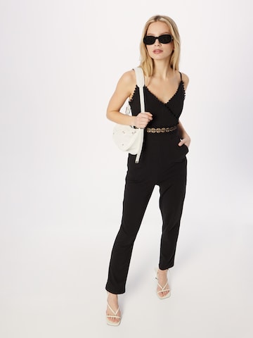 Tuta jumpsuit 'Valeria' di ABOUT YOU in nero