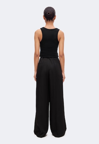 Wide leg Pantaloni con pieghe di Lindex in nero