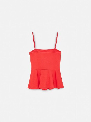 Haut Dilvin en rouge