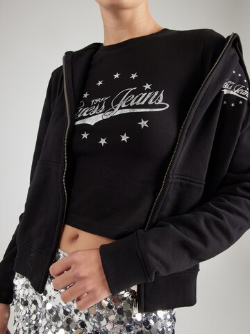 Maglietta di GUESS JEANS in nero