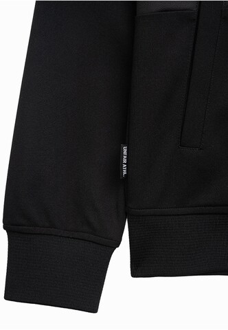 Unfair Athletics Between-season jacket 'Center Court Tracktop' in Black