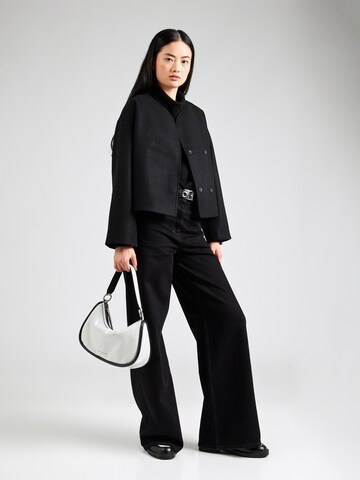 Veste mi-saison Gina Tricot en noir