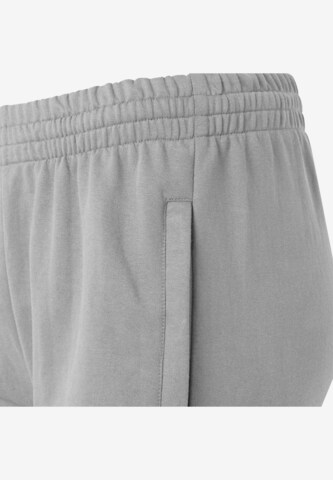 Tapered Pantaloni sport de la Hummel pe gri