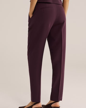 Slimfit Pantaloni con piega frontale di WE Fashion in lilla