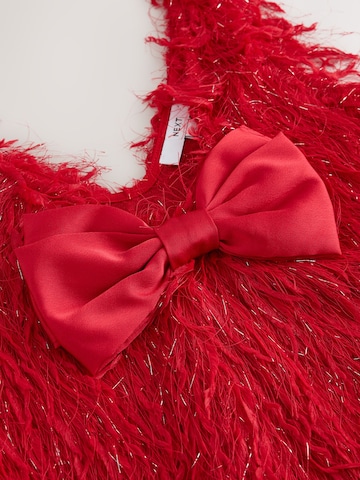 Haut Next en rouge