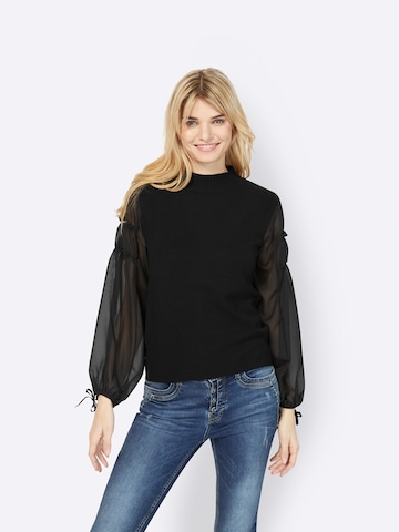 Pull-over heine en noir : devant