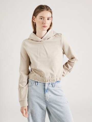 Sweat-shirt Calvin Klein Jeans en beige : devant