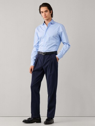 Tapered Pantaloni con pieghe di Hackett London in blu