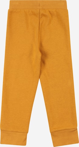 GAP Zwężany krój Spodnie w kolorze żółty