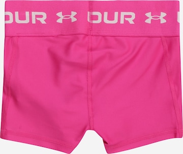 Skinny Pantaloni sportivi di UNDER ARMOUR in rosa