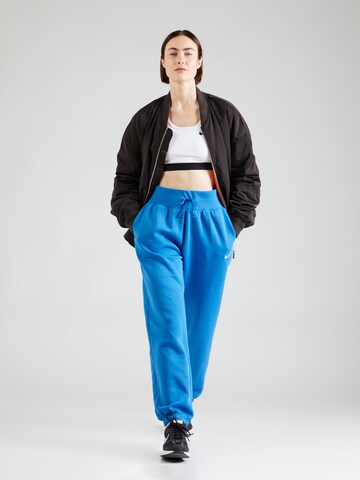 Tapered Pantaloni 'Phoenix Fleece' di Nike Sportswear in blu