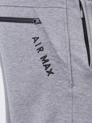 Skinny Pantalon Tommy Life en gris