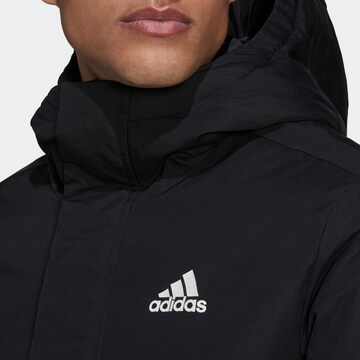 Veste outdoor 'Utilitas 3-Stripes ' ADIDAS SPORTSWEAR en noir