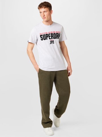 Superdry Normální Kalhoty – zelená