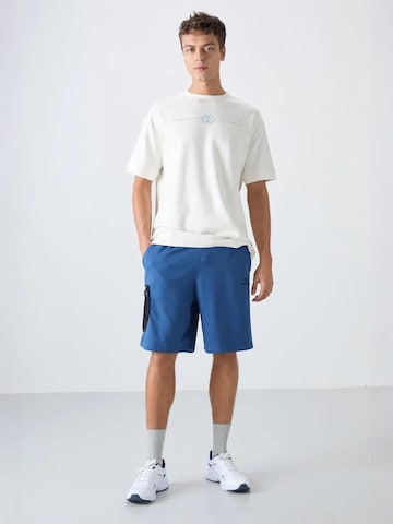 Tommy Life - Perna larga Calças cargo em azul