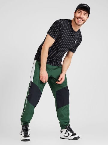 Tapered Pantaloni 'Air' de la Nike Sportswear pe verde