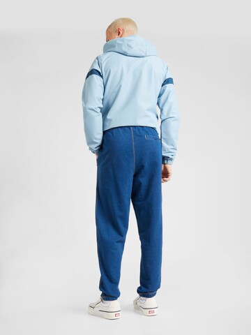 ELLESSE Tapered Hose 'Dempsi' in Blau