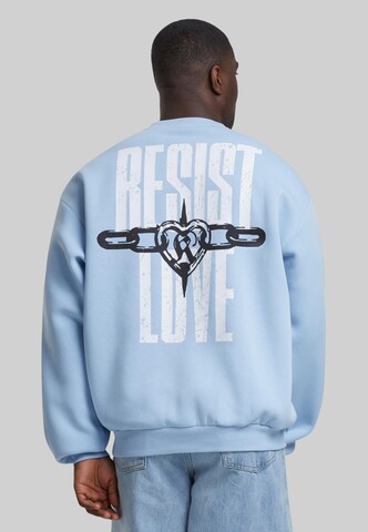 Sweat-shirt Karl Kani en bleu : devant