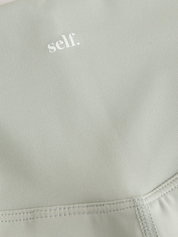 Skinny Leggings self. en vert