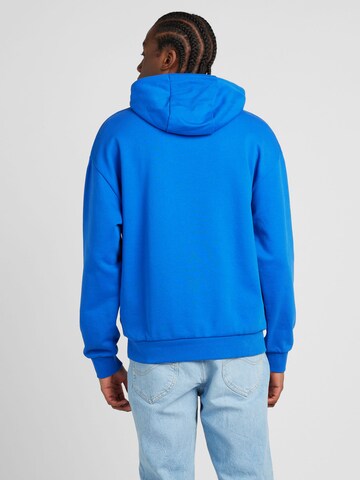 HUGO - Sweatshirt 'Nottyo' em azul