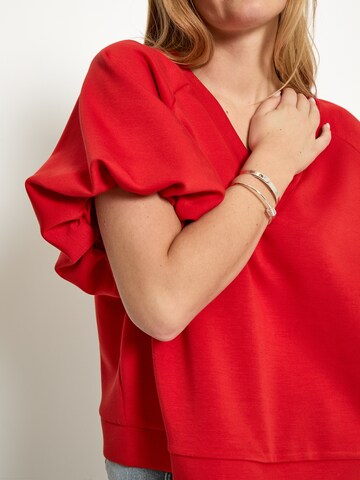 Maglietta 'Minnie' di Peppercorn in arancione