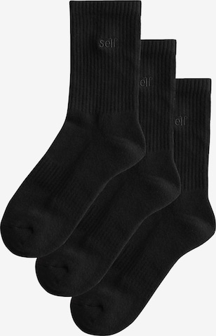 self. Socks in Black: front