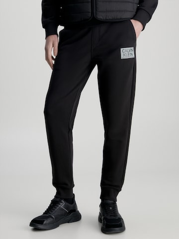 Calvin Klein Tapered Trousers in Black: front