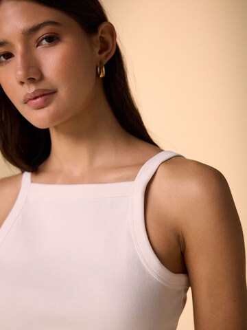 Haut Next en blanc