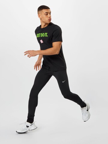 NIKE Skinny Sportbyxa 'Challenger' i svart