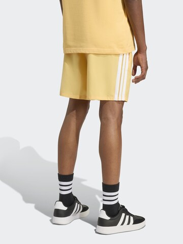 ADIDAS SPORTSWEAR Regular Спортен панталон 'Essentials Chelsea' в жълто