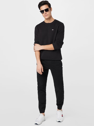 Tommy Jeans - Jersey 'Essential' en negro