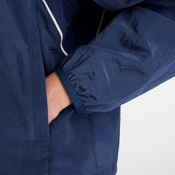 new balance Sports jacket 'Sport Legacy Jacket' in Blue