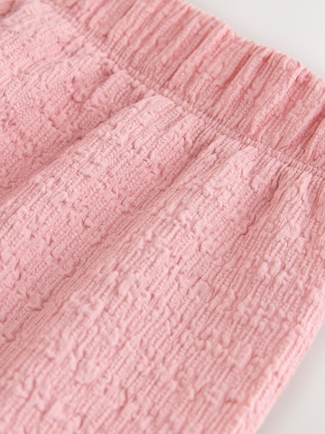 Set Next en rose