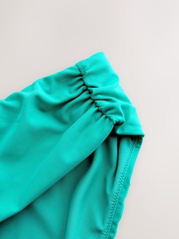 Slip bikini di Next in verde