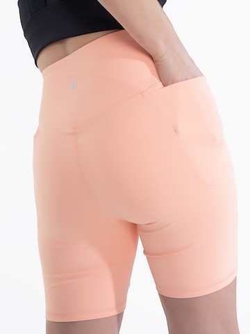 Skinny Pantaloni sportivi di Spyder in arancione