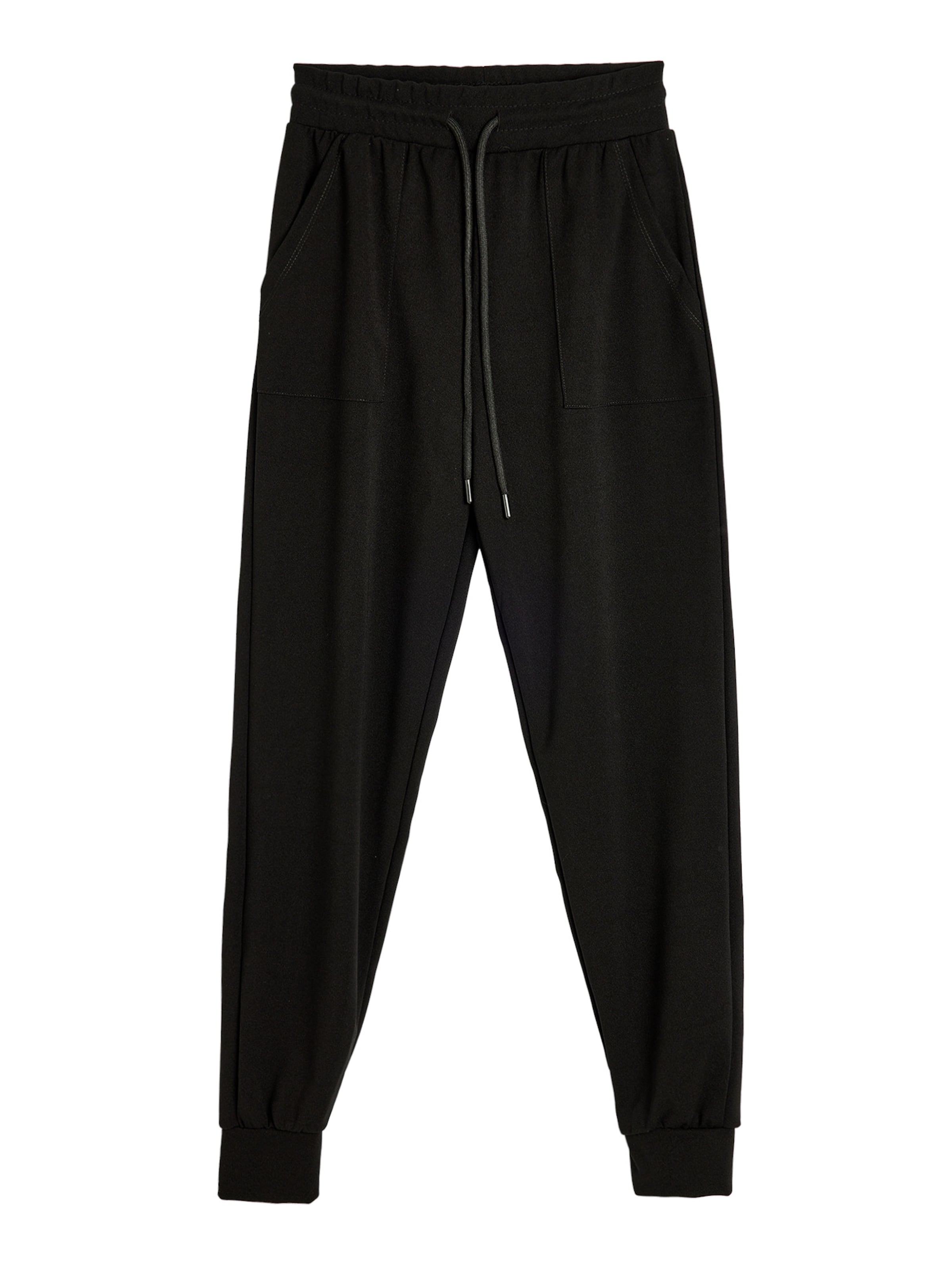 Koton Tapered Trousers in Black: front