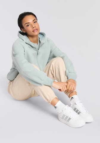 ADIDAS SPORTSWEAR Athletic Zip-Up Hoodie in Green