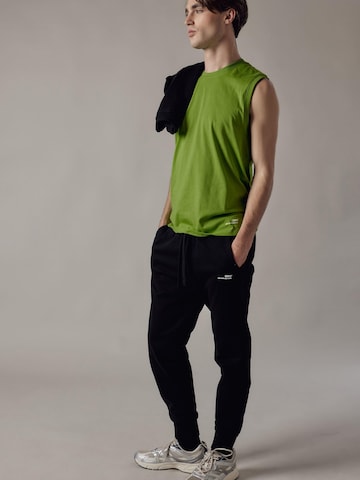 Maglietta 'Canotta' di OWN Off With Nature in verde