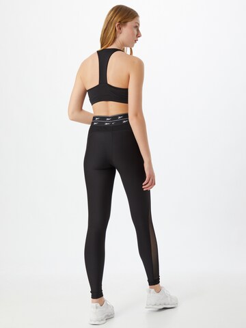 Skinny Pantaloni sportivi di Reebok in nero