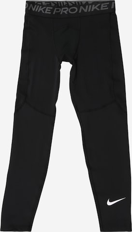 Skinny Pantalon de sport NIKE en noir : devant