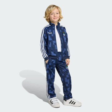 ADIDAS ORIGINALS Костюм для бега 'Adidas Originals X Minecraft Firebird' в Синий: спереди