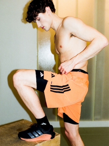 Regular Pantaloni sport 'D4T POWER' de la ADIDAS PERFORMANCE pe portocaliu