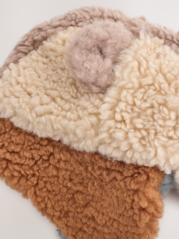 Căciulă de la Next pe bej