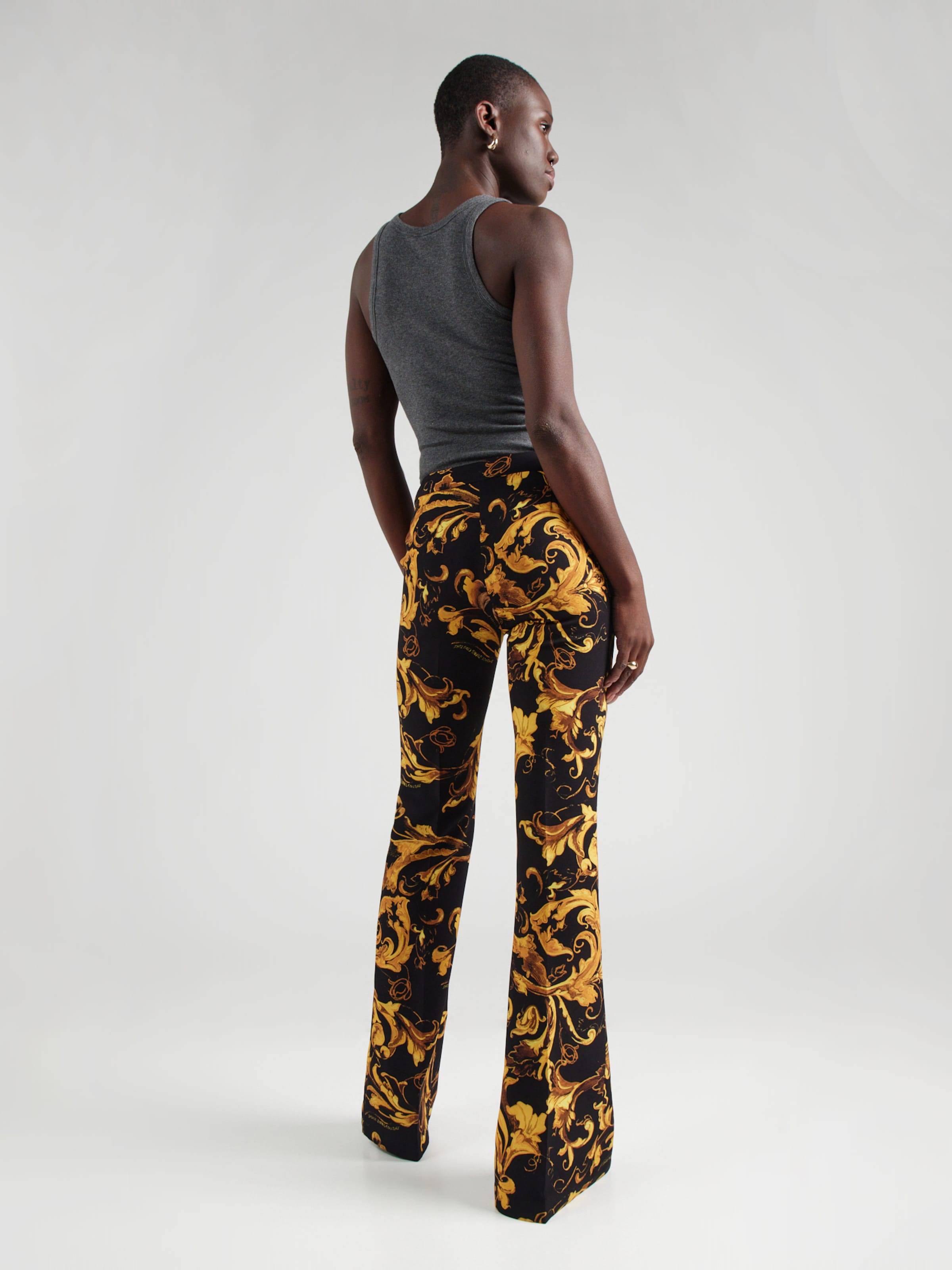 パンツ VERSACE JEANS COUTURE Bondage Pants Versace Jeans Couture Evazați Pantaloni pe Negru | ABOUT YOU