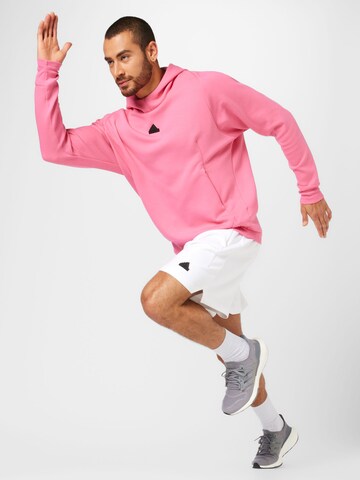 ADIDAS SPORTSWEAR - Sweatshirt de desporto 'New Z.N.E. Premium' em rosa