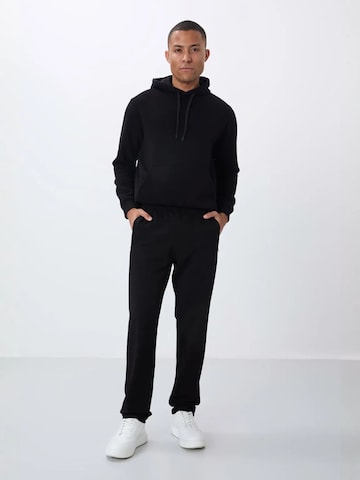 Tommy Life Skinny Sporthose 'Jogginghose'‌‌‌ in Schwarz