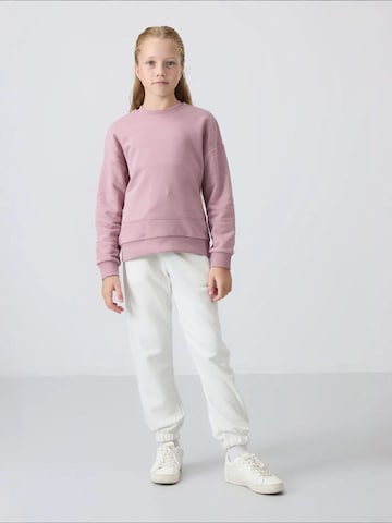 Tommy Life Bluzka sportowa 'TOMMY Jugend-Unisex-Sweatshirt Aus Baumwollmischung' w kolorze niebieski